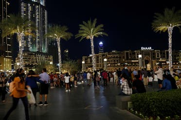 People are seen outside the Dubai mall during the holy month of Ramadan in Dubai, United Arab Emirates, April 23, 2021. REUTERS/Rula Rouhana