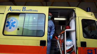 A medical worker wearing a protective face mask stands inside an ambulance during a protest outside a hospital, as the coronavirus disease (COVID-19) outbreak continues in Athens, Greece, November 12, 2020. (File photo: Reuters)