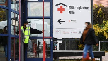 A woman walks to a coronavirus disease (COVID-19) vaccination center at Messe Berlin in Berlin, Germany, November 17, 2021. (Reuters)
