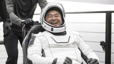 Japanese astronaut Akihiko Hoshide gets out of the Crew Dragon capsule off the coast of Florida after returning from the International Space Station on Nov. 8. (Twitter)