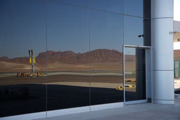 Reflections in the window of AlUla International Airport after the first ever international flight landed in the tourist destination. (Marco Ferrari Al Arabiya English)