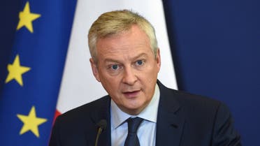 French Economy and Finance Minister Bruno Le Maire addresses a press conference along with OECD head to present a new OECD economic study about France at the Economy Ministry in Paris, on November 18, 2021. (AFP)