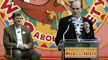 Walt Disney Parks and Resorts Chief Safety Officer Greg Hale (R) describes aspects of the company’'s new campaign, Wild About Safety, at a press event at Walt Disney World in Lake Buena Vista, Florida, May 22, 2003. At left is Al Weiss, president of Walt Disney World. (Reuters)