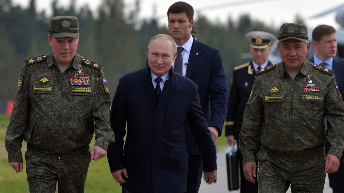 Russian President Vladimir Putin, accompanied by Defence Minister Sergei Shoigu, inspects the Zapad-2021 joint military drills of the armed forces of the Russian Federation and the Republic of Belarus at the Mulino army base in the Nizhny Novgorod region, some 350 kilometers east of Moscow, on September 13, 2021. (AFP)