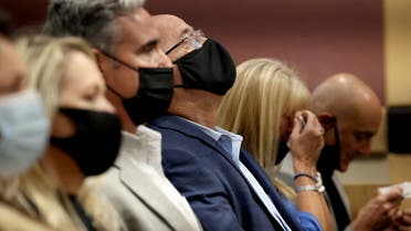 Fred Guttenberg looks up with tears in his eyes as his daughter's name is read aloud during Nikolas Cruz's guilty plea at Broward County Courthouse in Fort Lauderdale, Florida, U.S., October 20, 2021. Cruz pleaded guilty on all 17 counts of premeditated murder and 17 counts of attempted murder in the 2018 mass shooting at Marjory Stoneman Douglas High School in Parkland, Florida. Guttenberg's daughter, Jaime Guttenberg, 14, was among those killed. Amy Beth Bennett/Pool via REUTERS