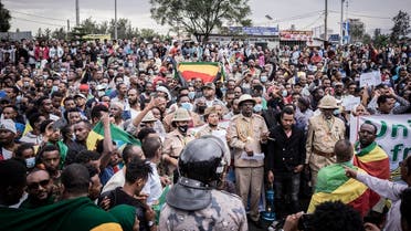 People gather during a protest called “No More” against purported fake news and foreign meddling at the British Embassy of Ethiopia in Addis Ababa, Ethiopia, on November 25, 2021. (Amanuel Sileshi/AFP)