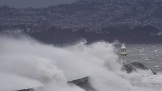 One dead as powerful storm batters UK