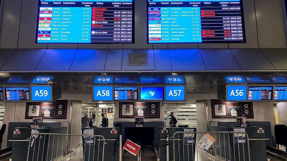 Digital display boards show cancelled flights to London - Heathrow at O.R. Tambo International Airport in Johannesburg, South Africa, November 26, 2021. (Reuters)