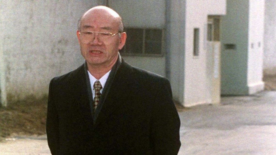 Former South Korean president Chun Doo-hwan stands outside the walls of Anyang Prison shortly after being released from the jail on a special pardon in Anyang December 22. Chun, originally sentenced to death on charges of mutiny, treason and corruption, had his sentence commuted to life in prison of which he served a little over a year before being pardoned. (Reuters)