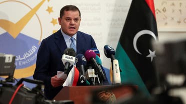 Libya's interim Prime Minister Abdulhamid Dbeibah speaks after registering his candidacy for next month's presidential election on November 21, 2021 in the capital Tripoli. (AFP)