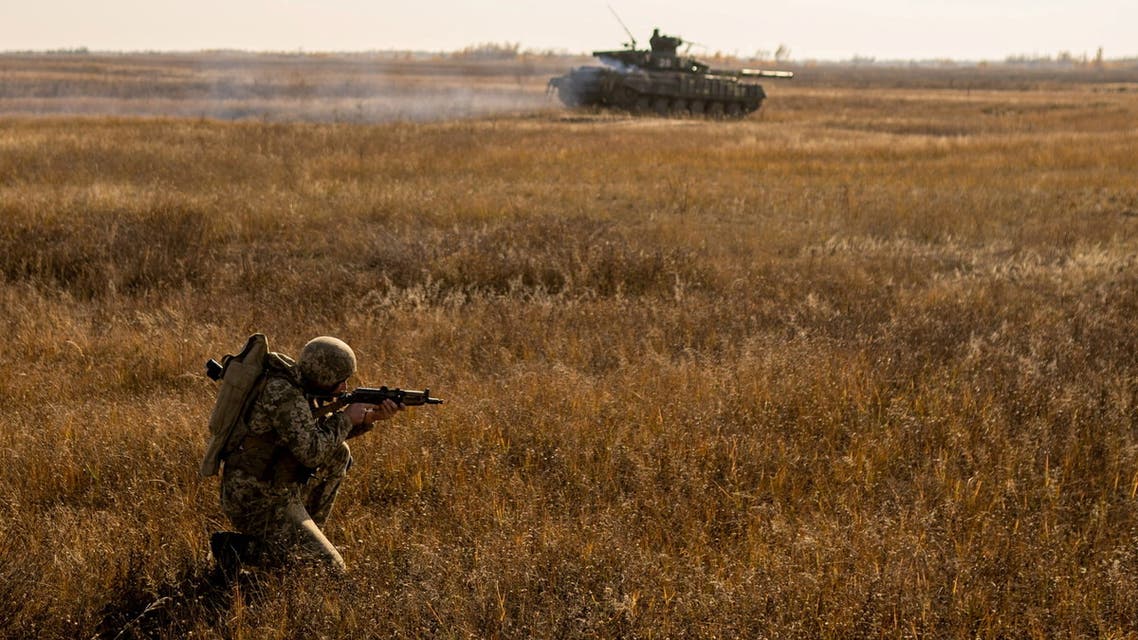 A serviceman of the Ukrainian Armed Forces takes part in military drills at a training ground near the border with Russian-annexed Crimea in Kherson region, Ukraine, in this handout picture released by the General Staff of the Armed Forces of Ukraine press service November 17, 2021. Press Service of General Staff of the Armed Forces of Ukraine/Handout via REUTERS ATTENTION EDITORS - THIS IMAGE HAS BEEN SUPPLIED BY A THIRD PARTY./File Photo