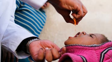 A boy receives polio vaccination drops during a house-to-house vaccination campaign in Sanaa, Yemen February 20, 2017. REUTERS/Khaled Abdullah