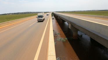 A vehicle drives over a bridge on the new Chinese-built 51-kilometer (31 miles) four-lane expressway connecting Uganda's capital Kampala to Entebbe International Airport, in Kampala, Uganda. (File photo: Reuters)