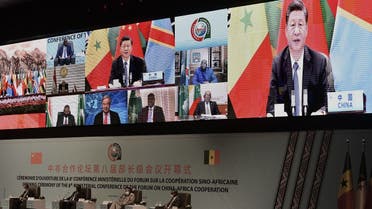 Chinese President Xi Jinping (on the screen) delivers his speech during the China-Africa Cooperation (FOCAC) meeting in Dakar, Senegal, on November 29, 2021. (Seyllou/AFP)