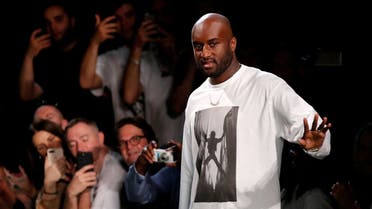 Designer Virgil Abloh appears at the end of his Spring/Summer 2019 collection for Off-white fashion label during Mens’ Fashion Week in Paris, France, on June 20, 2018. (Reuters)