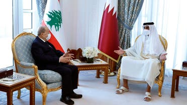 Qatar's Emir Sheikh Tamim bin Hamad Al Thani meets with Lebanese President Michel Aoun, in Doha, Nov 29, 2021. (AP)