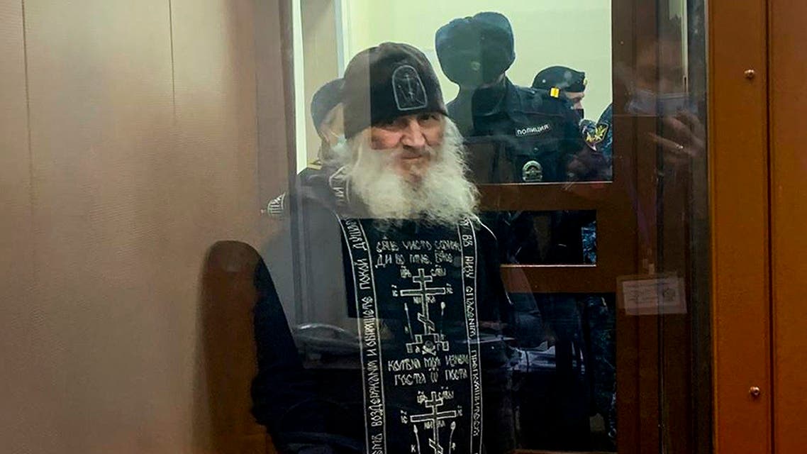 Father Sergiy, a Russian monk who has defied the Russian Orthodox Church’s leadership, stands in a cage prior to a court session in Moscow, Russia, Dec. 29, 2020. (Basmanny Court, Moscow News Agency photo via AP)