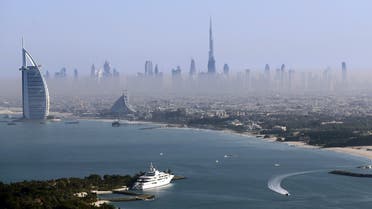 Burj Khalifa, the world's tallest tower, and luxury Burj al-Arab Hotel (L) are seen in a general view of Dubai, UAE December 9, 2015. (Reuters)