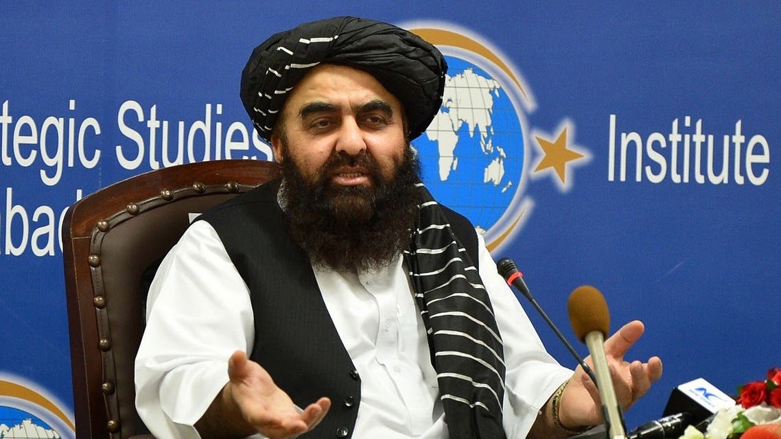 Afghanistan’s acting Foreign Minister Amir Khan Muttaqi gestures while speaking during an event held in the Institute of Strategic Studies in Islamabad on November 12, 2021. (Farooq Naeem/AFP)