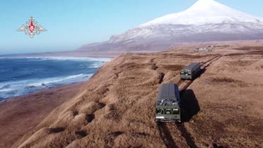 In this handout photo released by Russian Defense Ministry Press Service, A Bastion missile launcher is positioned on the Matua Island, part of the Kurils Islands chain, in Russia, Thursday, Dec. 2, 2021. The Russian military has deployed the Bastion coastal defense missile systems on the Matua Island, which is close to several islands also claimed by Japan, a move intended to underline Moscow's firm stance in the dispute. (Russian Defense Ministry Press Service via AP)