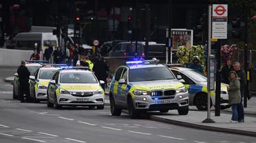 A file photo shows British Police vehicles are seen as officers respond to a security alert at St Thomas’ Hospital in central London on October 13, 2020. (AFP)