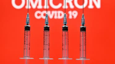 An illustration picture taken in London on Dec. 2, 2021 shows four syringes. (AFP)