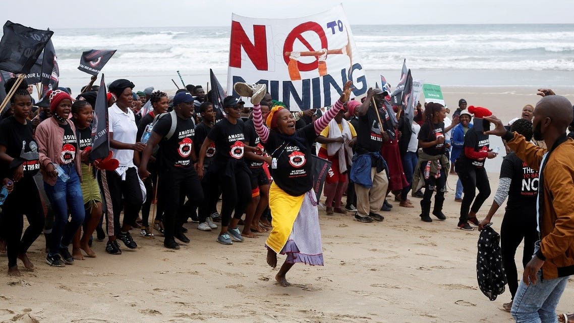 Wild Coast residents demonstrate against Royal Dutch Shell’s plans to start seismic surveys to explore petroleum systems off the country’s popular Wild Coast at Mzamba Beach, Sigidi, South Africa, on December 5, 2021. (Reuters)