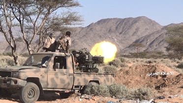 Houthi fighters fire a machine gun mounted on a truck at a frontline in al-Jubah district of Yemen's Marib province. (Reuters)