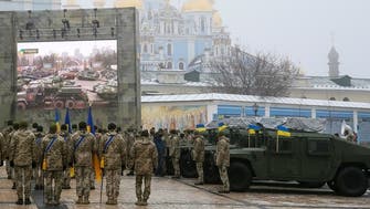 Ukraine marks army day with US armored vehicles, boats and vows to fight off Russia