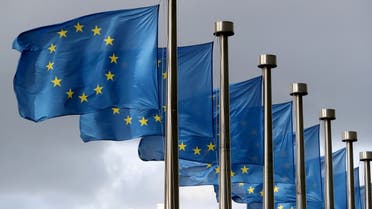 EU flags flutter in front of the European Commission headquarters in Brussels, Belgium. (Reuters)