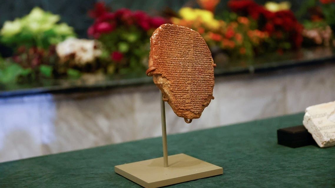 The Gilgamesh Dream Tablet, stolen from Iraq in 1991, returned to Iraq after it was seized by the U.S. government, is displayed at the Ministry of Foreign Affairs in Baghdad, Iraq, on December 7, 2021. (Reuters)