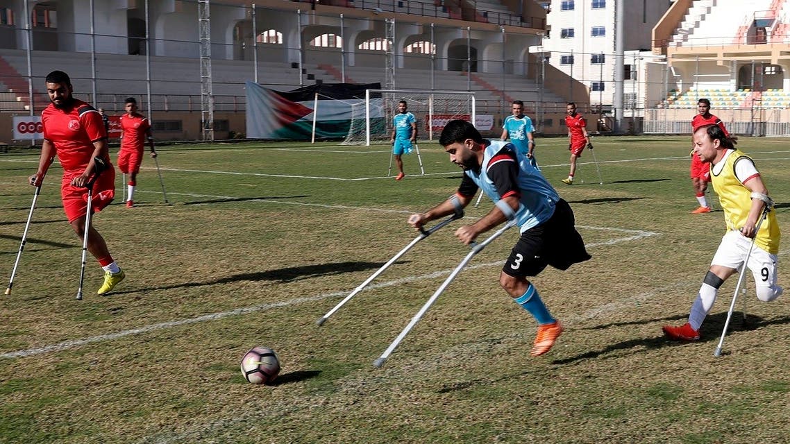Palestinian amputees play a soccer match while using their crutches during a training session, at Palestine Stadium in Gaza City, Sunday, Dec. 5, 2021. (AP)