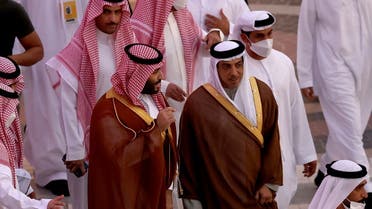 Saudi Arabia’s Crown Prince Mohammed bin Salman (C-L) is toured around Expo 2020 Dubai by the UAE’s deputy prime minister Sheikh Mansour bin Zayed Al-Nahyan (C-R), in the gulf emirate of Dubai on December 8, 2021. (AFP)