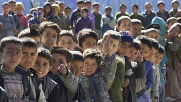 Afghan orphan children look at WFP delegation at Allahudin orphanage in western Kabul. (File photo: Reuters)