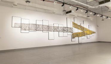 Kaabi-Linke’s monumental work consists of 19 canvases depicting the cracks in a sign bearing an arrow, a symbol associated with the aviation industry and with economic growth. (Courtesy: SPA)