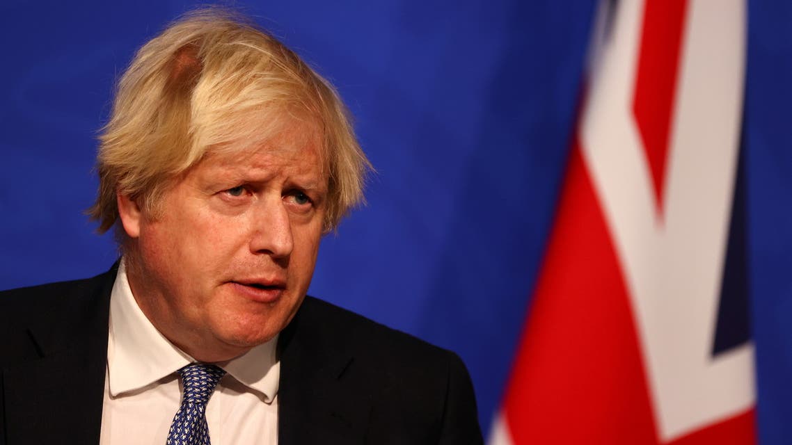 British Prime Minister Boris Johnson holds a news conference for the latest coronavirus disease (COVID-19) update in the Downing Street briefing room, in London, Britain December 8, 2021. Adrian Dennis/Pool via REUTERS