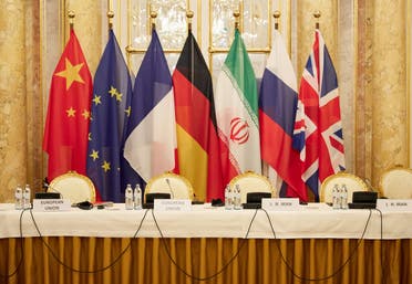 EEAS shows flags of participating states during a meeting of the joint commission on negotiations aimed at reviving the Iran nuclear deal in Vienna, Austria. Negotiators of the Iranian nuclear deal met on December 9, 2021, 'determined to work hard' to save the 2015 deal after the suspension of talks last week. (AFP)