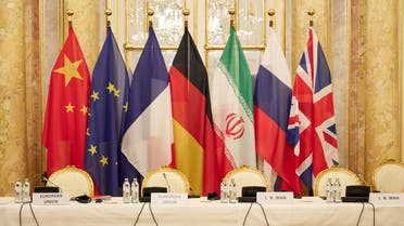 Flags of participating states during a meeting to revive the Iran nuclear deal in Vienna, Dec. 9, 2021. (AFP). 