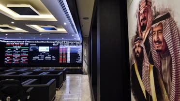 This picture taken December 12, 2019 shows (L) a view of the exchange board at the Stock Exchange Market (Tadawul) bourse in Riyadh. (AFP)