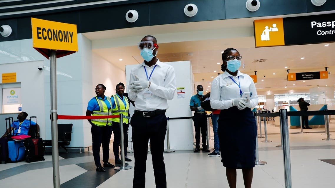 Health workers wait to screen travelers for signs of the coronavirus at the Kotoka International Airport in Accra, Ghana. (File photo: Reuters)