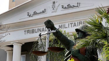 A statue of soldier carries balance, symbol of justice, is seen outside the military court in Beirut, May 27, 2020. (AP)