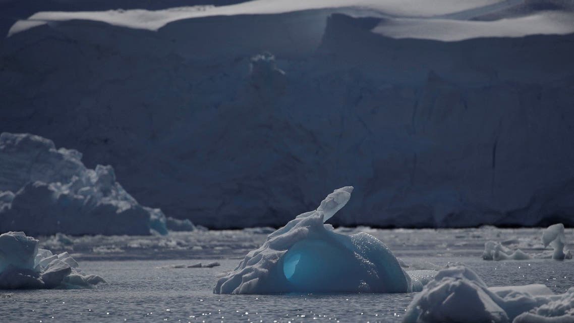 An iceberg floats along the water, close to Fournier Bay, Antarctica. (Reuters)