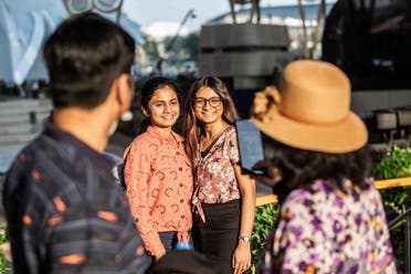 Visitors take a picture at Al Wasl Plaza. (Supplied)