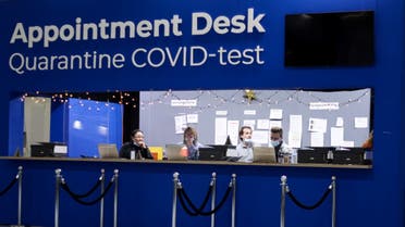 A picture taken on November 29, 2021 at the Schiphol airport shows an appointment desk for Covid-19 test. (AFP)