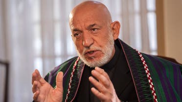 Former President of Afghanistan Hamid Karzai speaks during an interview with the Associated Press in Kabul, Dec. 10, 2021. (AP)