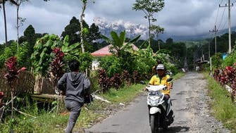 Indonesia Semeru volcano erupts again, rescuers flee search location