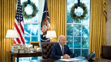 US President Joe Biden speaks before signing an executive order related to government services in the Oval Office, Dec. 13, 2021. (AFP)