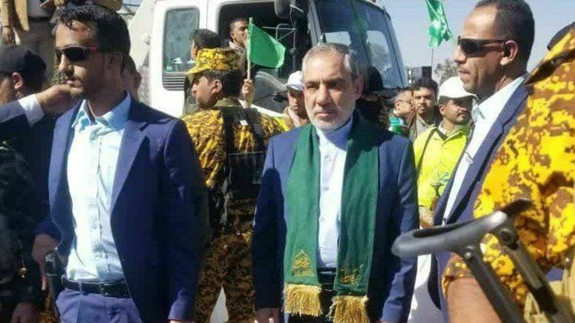 Iran's Ambassador to the Houthis Hassan Irlu (center) pitured with security guards. (Twitter)
