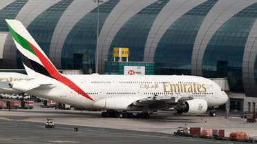 An Emirates Airbus A380-842 aircraft is pictured grounded at Dubai international Airport in Dubai. (AFP)