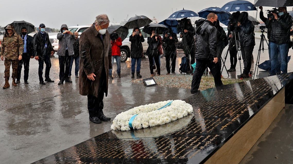 UN Secretary-General Antonio Guterres lays a wreath on December 20, 2021, at the site of the August 4, 2020 cataclysmic port explosion that ravaged the Lebanese capital Beirut. (AFP)
